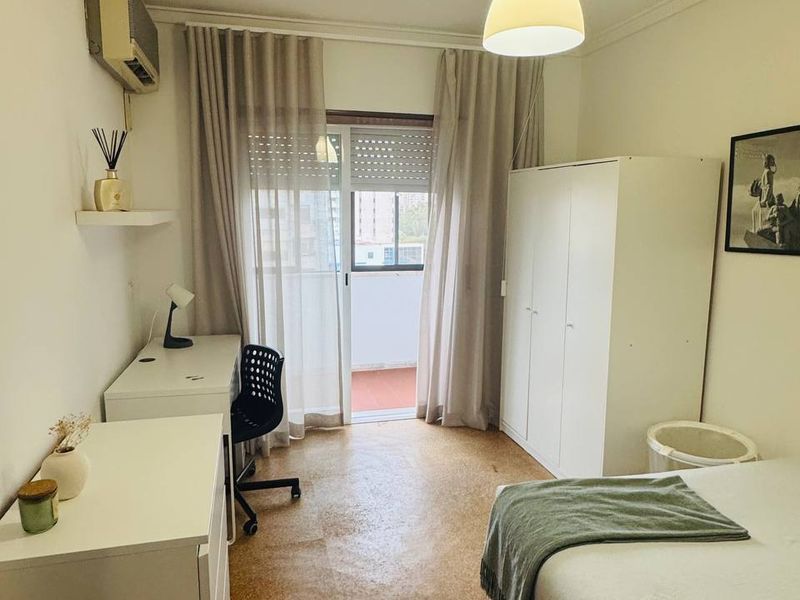 Room w/ enclosed balcony, photo 1 of 3
