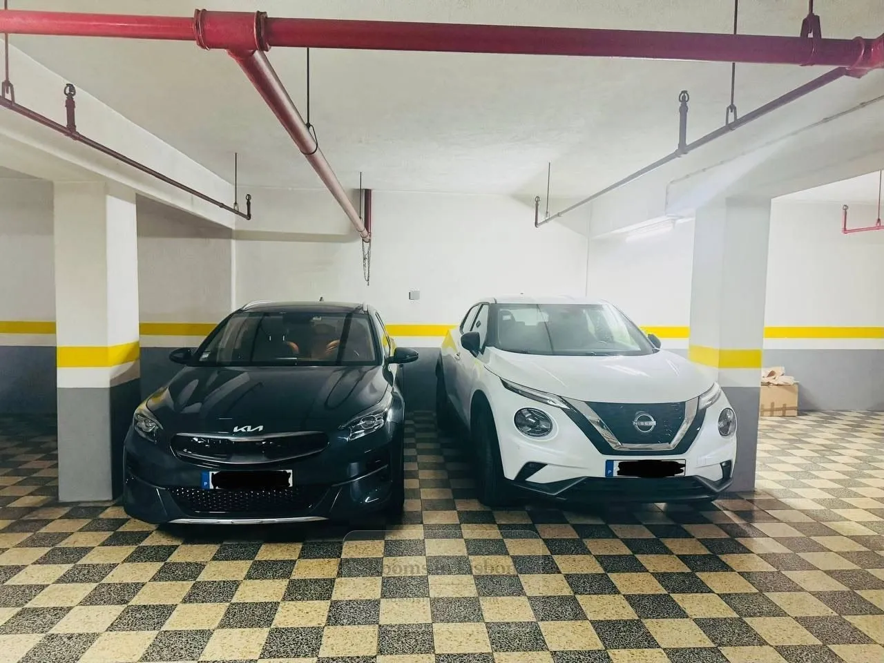 Two garage spaces, side by side, photo 1 of 2